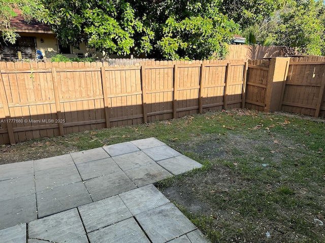 28315 SW 141st Pl Unit 28315, Homestead, FL 33033 - fenced backyard featuring a patio area