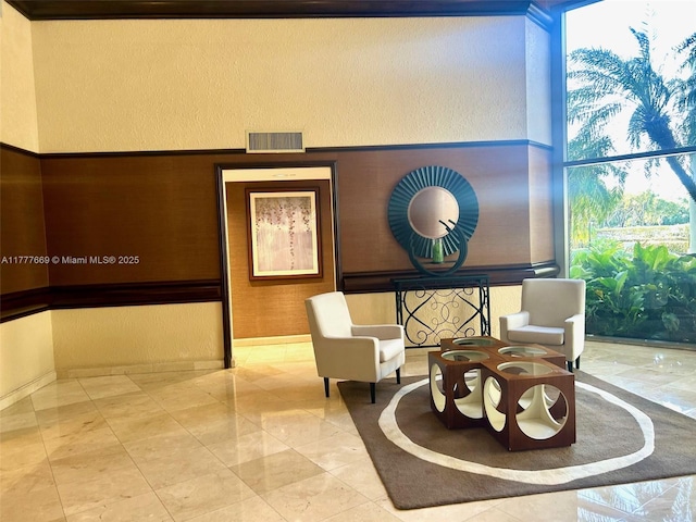 lobby featuring visible vents