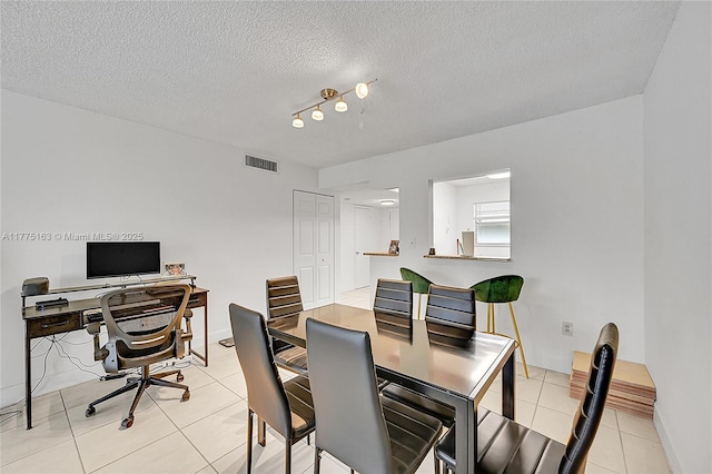 1820 SW 81st Ave Unit 3300, North Lauderdale, FL 33068 - dining area with light tile patterned floors, visible vents, and a textured ceiling