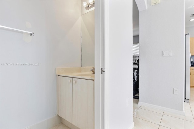 1431 SE 18th Ter, Homestead, FL 33035 - bathroom featuring tile patterned floors, vanity, and baseboards