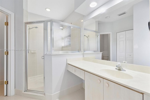 1431 SE 18th Ter, Homestead, FL 33035 - bathroom featuring vanity, toilet, a shower stall, tile patterned floors, and visible vents