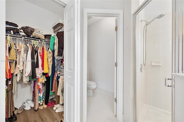 1431 SE 18th Ter, Homestead, FL 33035 - full bath with a spacious closet, toilet, and a stall shower