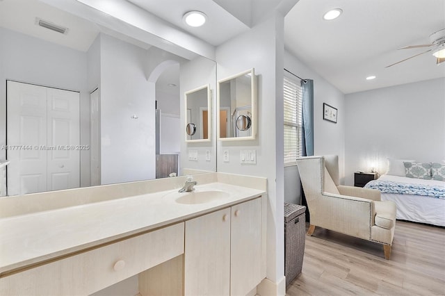 1431 SE 18th Ter, Homestead, FL 33035 - ensuite bathroom featuring wood finished floors, ensuite bath, visible vents, ceiling fan, and recessed lighting