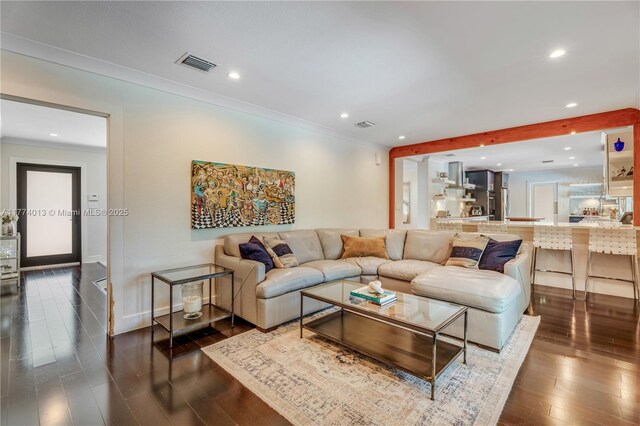 7465 SW 159th Ter, Palmetto Bay, FL 33157 - living area featuring recessed lighting, visible vents, crown molding, and dark wood-type flooring