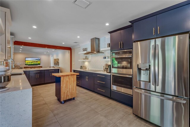 7465 SW 159th Ter, Palmetto Bay, FL 33157 - kitchen featuring visible vents, wood counters, stainless steel appliances, open shelves, and exhaust hood