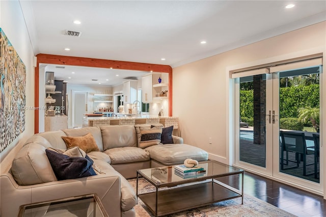 7465 SW 159th Ter, Palmetto Bay, FL 33157 - living room featuring crown molding, recessed lighting, french doors, dark wood-type flooring, and visible vents