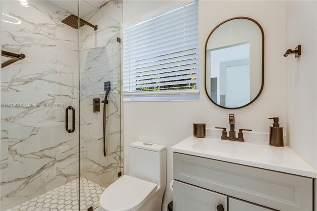 7465 SW 159th Ter, Palmetto Bay, FL 33157 - bathroom featuring a marble finish shower, toilet, and vanity