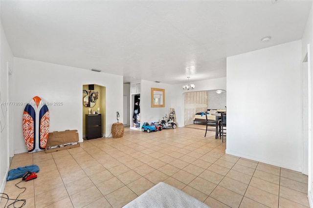 6930 SW 5th St, Pembroke Pines, FL 33023 - living area featuring a chandelier and light tile patterned flooring