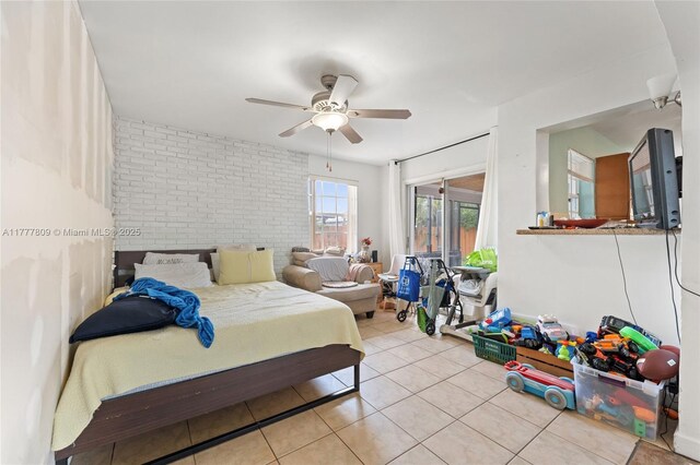 6930 SW 5th St, Pembroke Pines, FL 33023 - bedroom with a ceiling fan, tile patterned flooring, access to outside, and brick wall
