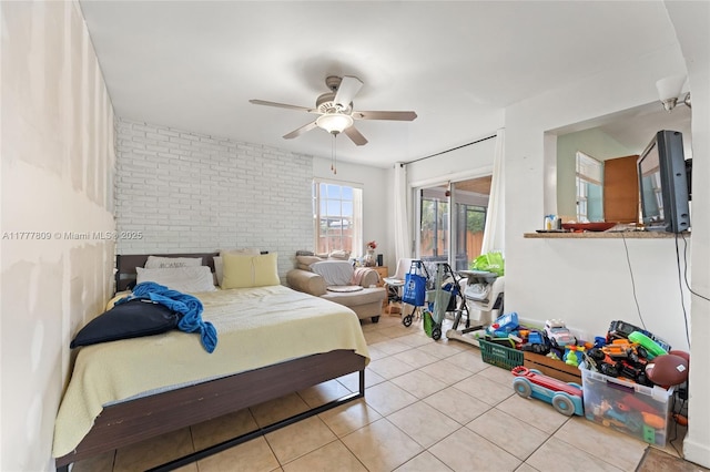 6930 SW 5th St, Pembroke Pines, FL 33023 - tiled bedroom featuring brick wall, a ceiling fan, and access to exterior