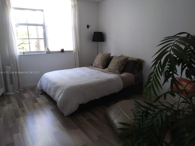 19901 E Country Club Dr Unit 2305, Aventura, FL 33180 - bedroom featuring wood finished floors