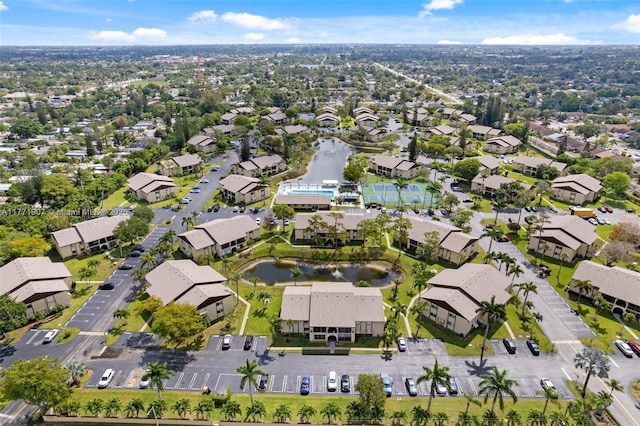 336 Pine Ridge Cir Unit B-1, Green Acres, FL 33463 - drone / aerial view featuring a water view and a residential view