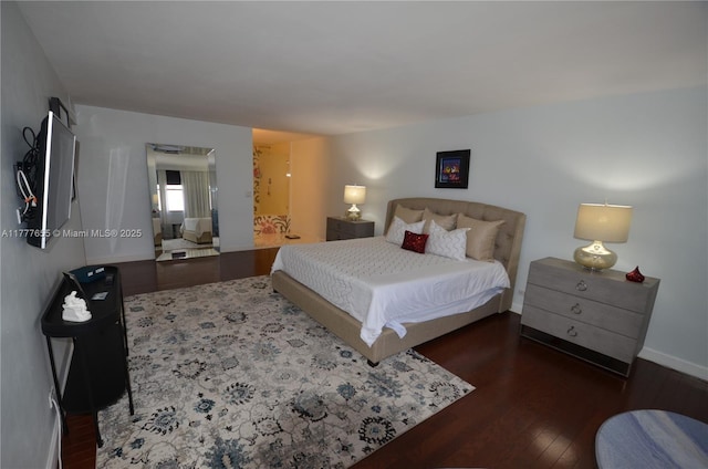 1800 NE 114th St Unit 1903, Miami, FL 33181 - bedroom featuring baseboards and wood finished floors