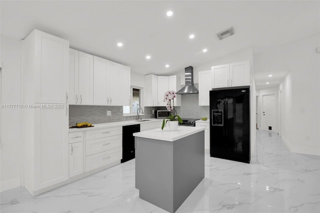 17663 SW 5th St, Pembroke Pines, FL 33029 - kitchen with decorative backsplash, marble finish floor, wall chimney range hood, white cabinetry, and black appliances