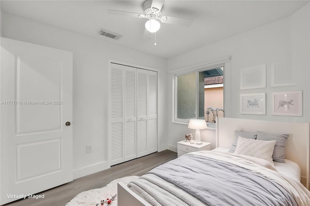 17663 SW 5th St, Pembroke Pines, FL 33029 - bedroom with a ceiling fan, visible vents, wood finished floors, baseboards, and a closet