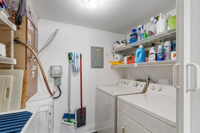 337 Pine Ridge Cir Unit C-1, Green Acres, FL 33463 - clothes washing area featuring independent washer and dryer, laundry area, and electric panel