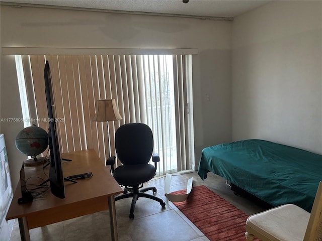 1701 Washington St Unit 404, Hollywood, FL 33020 - bedroom featuring multiple windows and a desk