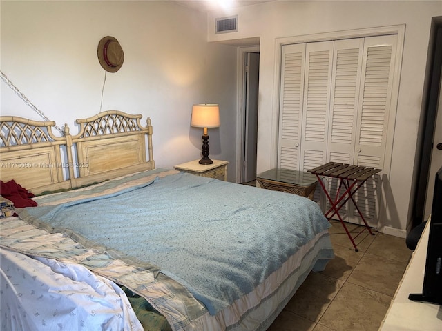 1701 Washington St Unit 404, Hollywood, FL 33020 - bedroom featuring tile patterned flooring and a closet
