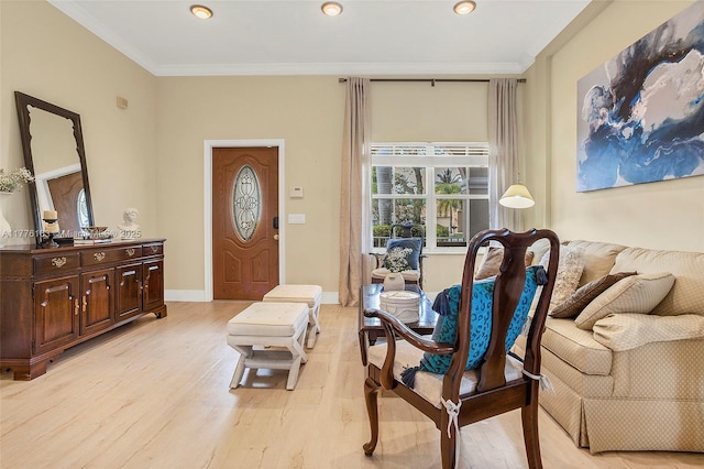 interior space featuring light wood-style floors, crown molding, and recessed lighting