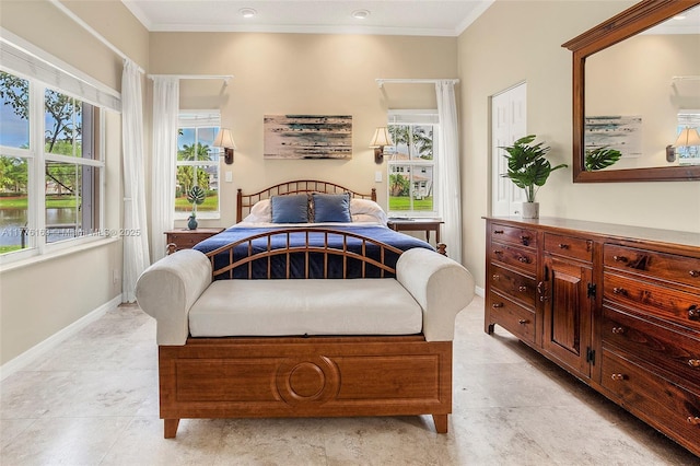 bedroom featuring baseboards and ornamental molding