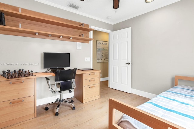 bedroom featuring crown molding, ceiling fan, light wood-style flooring, visible vents, and baseboards