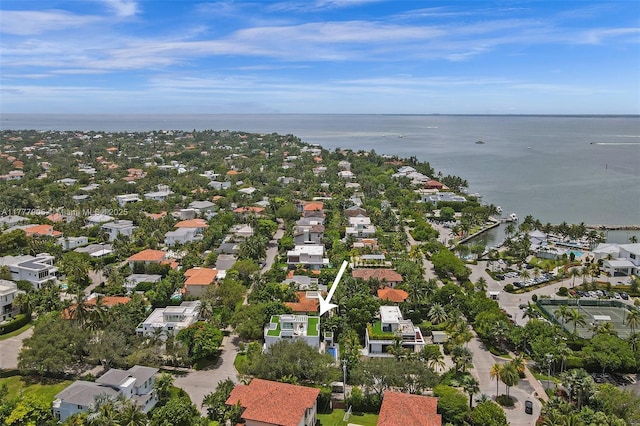 bird's eye view featuring a water view and a residential view