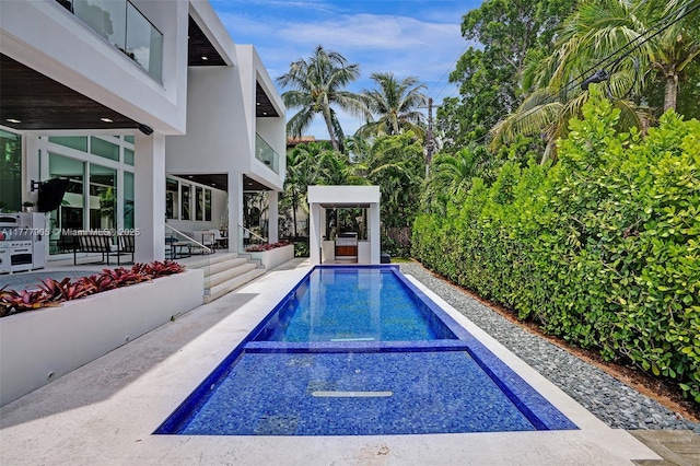 pool featuring a patio