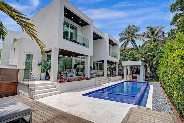 view of pool featuring a patio and an infinity pool