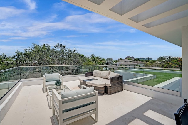 balcony featuring an outdoor living space