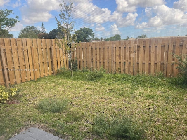 view of yard featuring fence