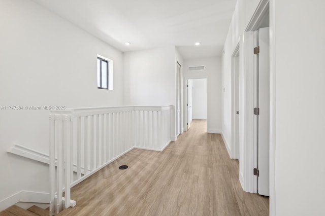 18918 SW 345th Ter, Homestead, FL 33034 - corridor featuring an upstairs landing, wood finished floors, baseboards, and recessed lighting