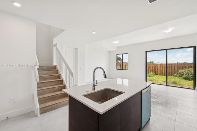 18918 SW 345th Ter, Homestead, FL 33034 - kitchen with a sink, dishwashing machine, light countertops, light tile patterned flooring, and recessed lighting