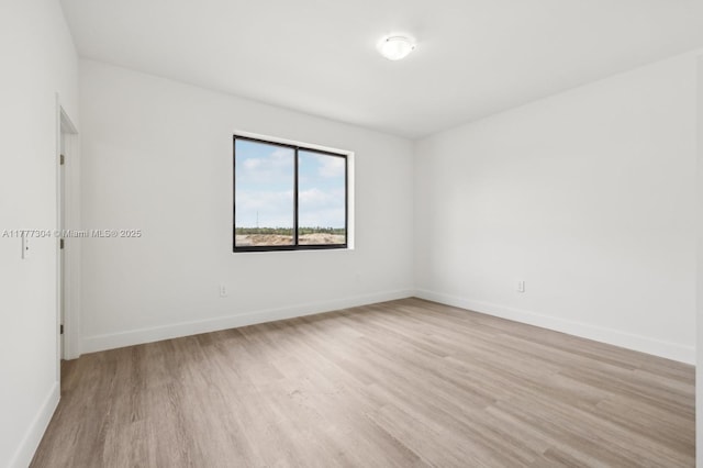 18918 SW 345th Ter, Homestead, FL 33034 - empty room featuring light wood-type flooring and baseboards
