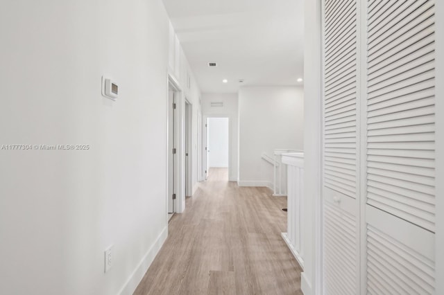 18918 SW 345th Ter, Homestead, FL 33034 - hall with light wood-style floors, baseboards, and recessed lighting