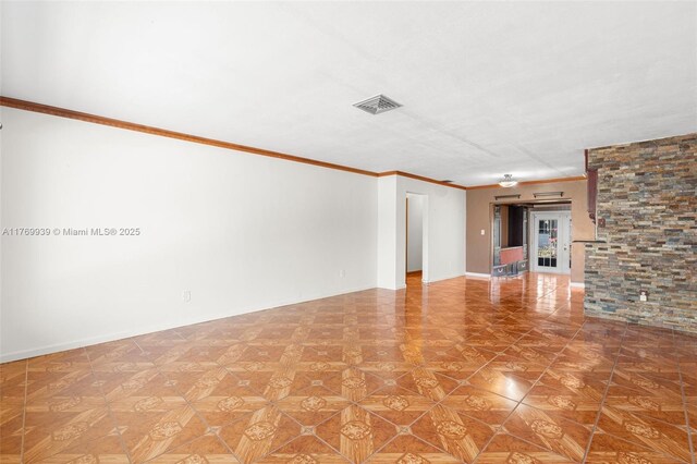 4340 NW 6th St, Plantation, FL 33317 - unfurnished living room with ornamental molding, baseboards, and visible vents