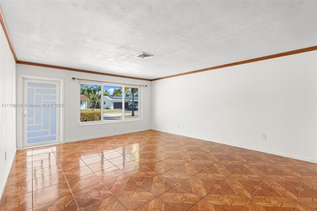 4340 NW 6th St, Plantation, FL 33317 - spare room featuring crown molding, baseboards, and a textured ceiling