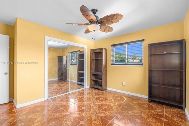 4340 NW 6th St, Plantation, FL 33317 - unfurnished bedroom with baseboards, a closet, and a ceiling fan