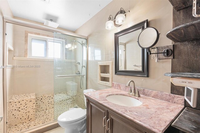 4340 NW 6th St, Plantation, FL 33317 - bathroom featuring vanity, toilet, and a shower stall