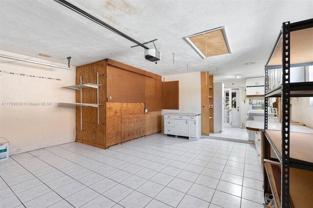 4340 NW 6th St, Plantation, FL 33317 - kitchen featuring light countertops and open shelves