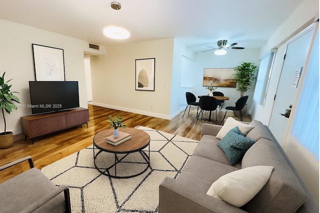 13250 SW 4th Ct Unit 405G, Pembroke Pines, FL 33027 - living room with wood finished floors and a ceiling fan