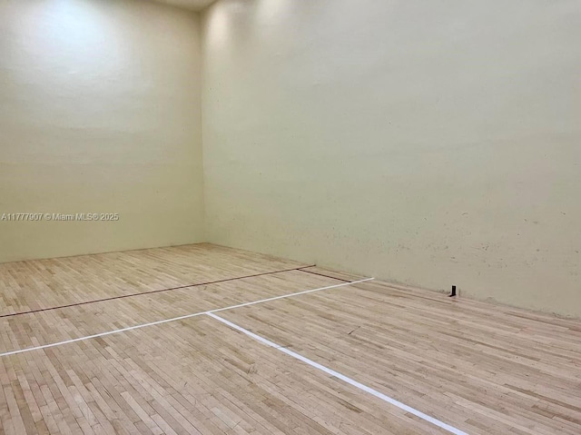 view of property's community with a sport court