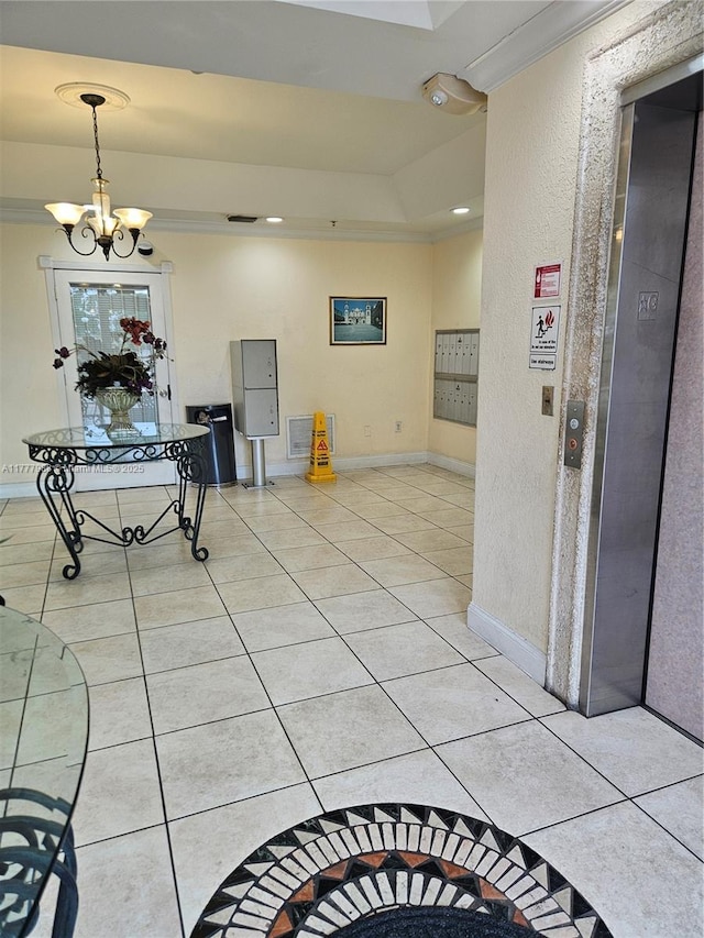 interior space with elevator, a chandelier, and light tile patterned floors