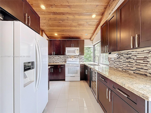 kitchen featuring light tile patterned floors, white appliances, tasteful backsplash, wood ceiling, and a sink