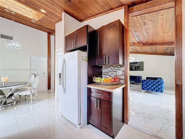 kitchen featuring wooden ceiling, white fridge with ice dispenser, backsplash, and a notable chandelier