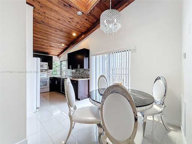 dining room featuring light tile patterned floors, baseboards, an inviting chandelier, and wood ceiling