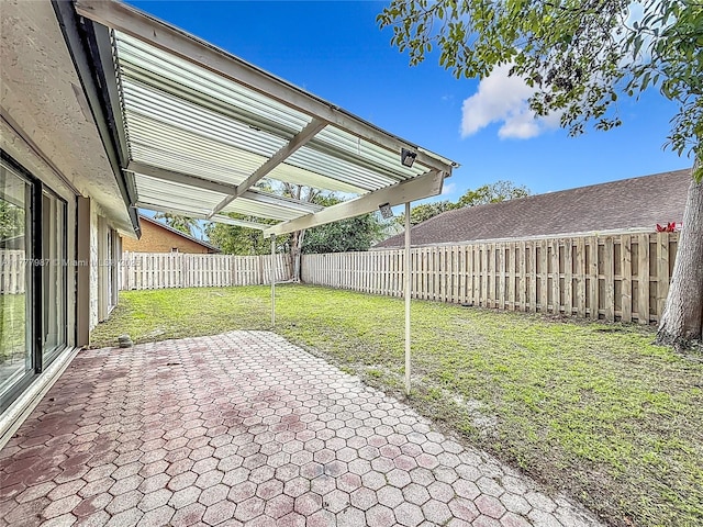 view of yard with a patio and a fenced backyard