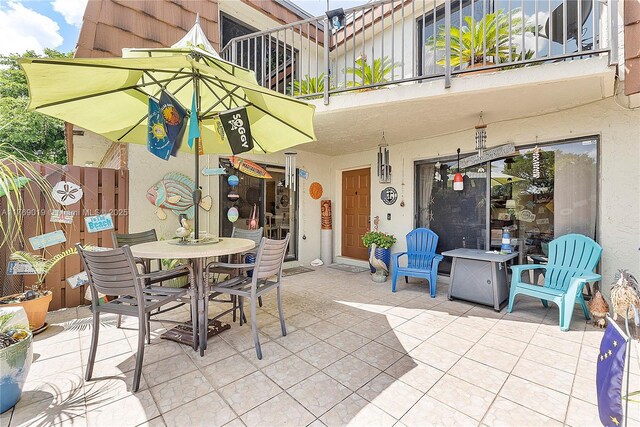 11861 SW 13th Ct, Davie, FL 33325 - view of patio / terrace featuring a balcony and outdoor dining space