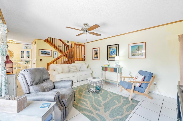11861 SW 13th Ct, Davie, FL 33325 - living room with a ceiling fan, tile patterned flooring, stairway, a textured ceiling, and ornamental molding