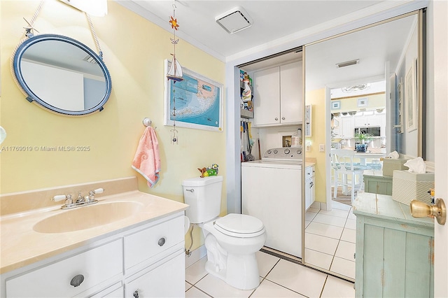 11861 SW 13th Ct, Davie, FL 33325 - bathroom featuring washer / dryer, crown molding, vanity, tile patterned flooring, and toilet