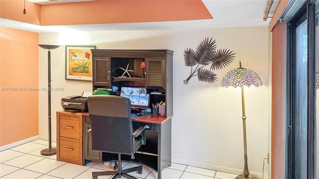 11861 SW 13th Ct, Davie, FL 33325 - office featuring a textured ceiling, baseboards, and light tile patterned floors